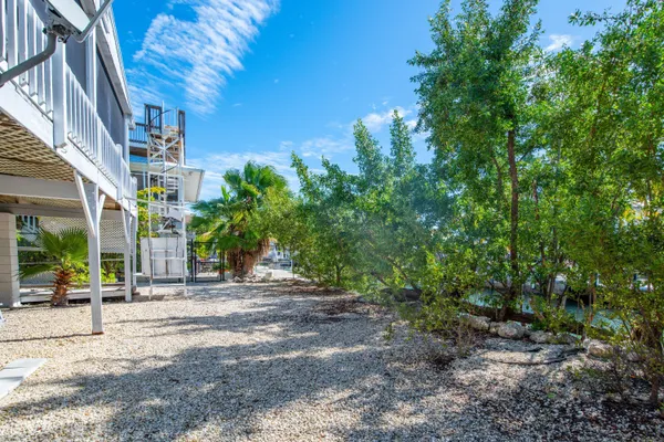 a view of street with tall buildings