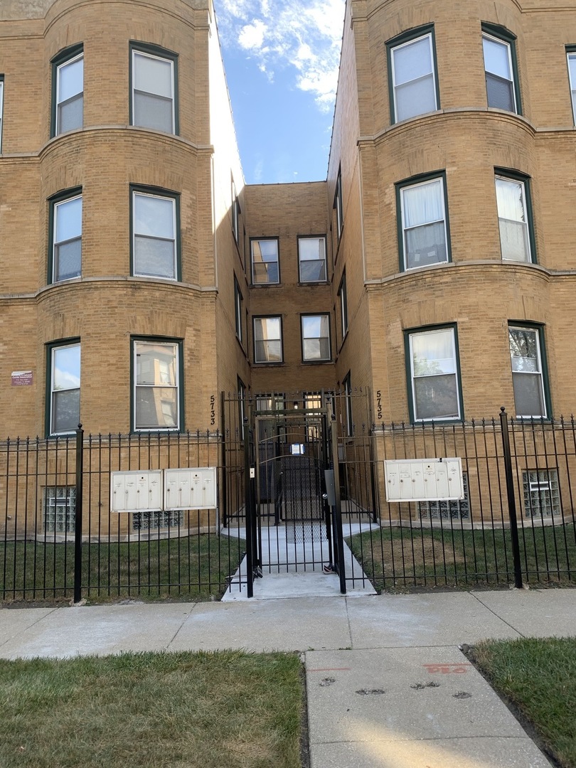 Undisclosed Address Chicago, IL 60637 - Photo 14 of 16 a view of a brick building and a yard