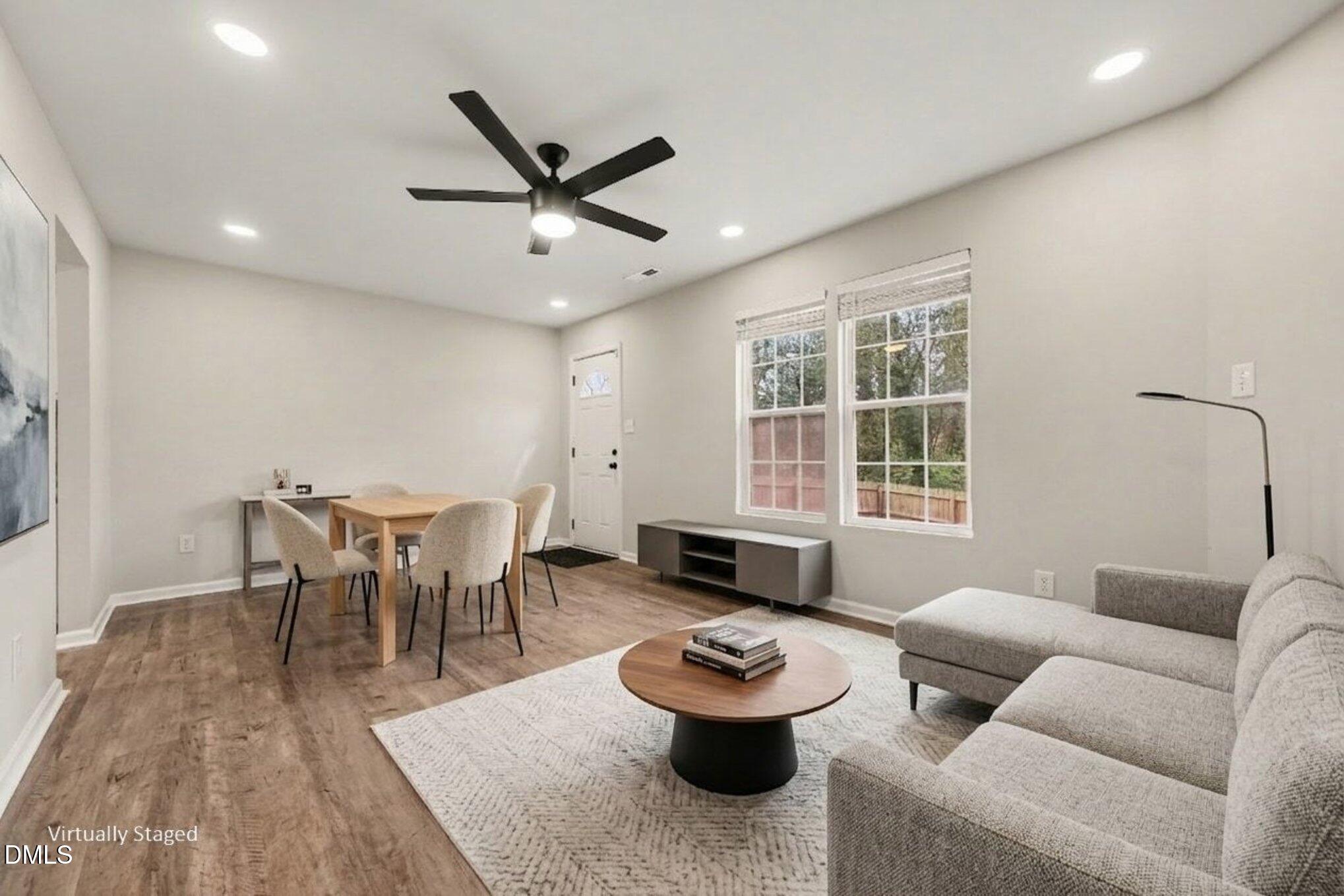 702 Brye Street Durham, NC 27703 - Photo 10 of 32 a living room with furniture and a large window