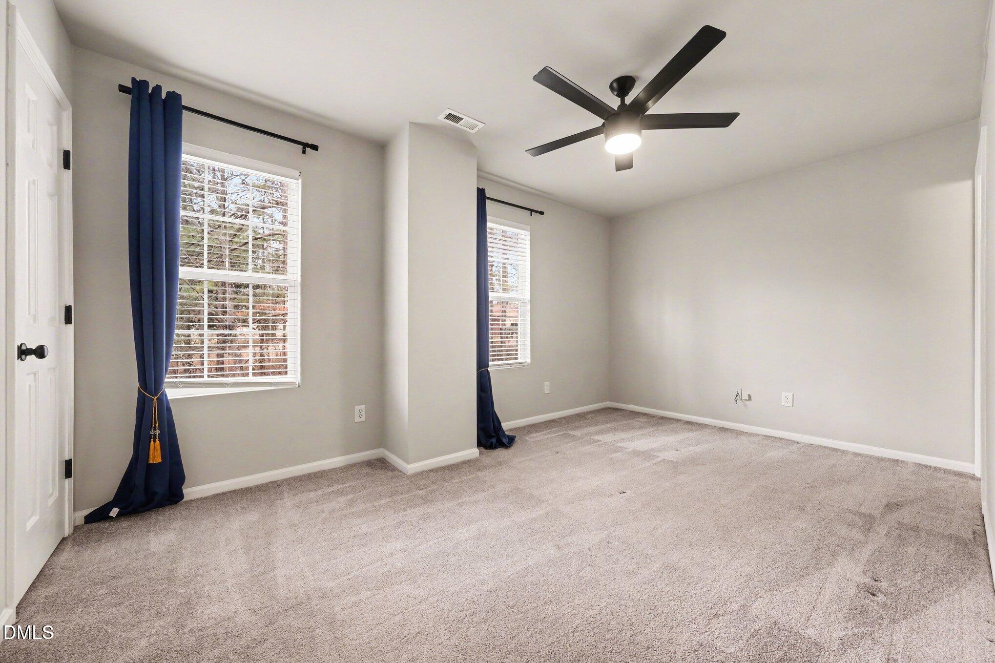 702 Brye Street Durham, NC 27703 - Photo 21 of 32 wooden floor in an empty room with a window