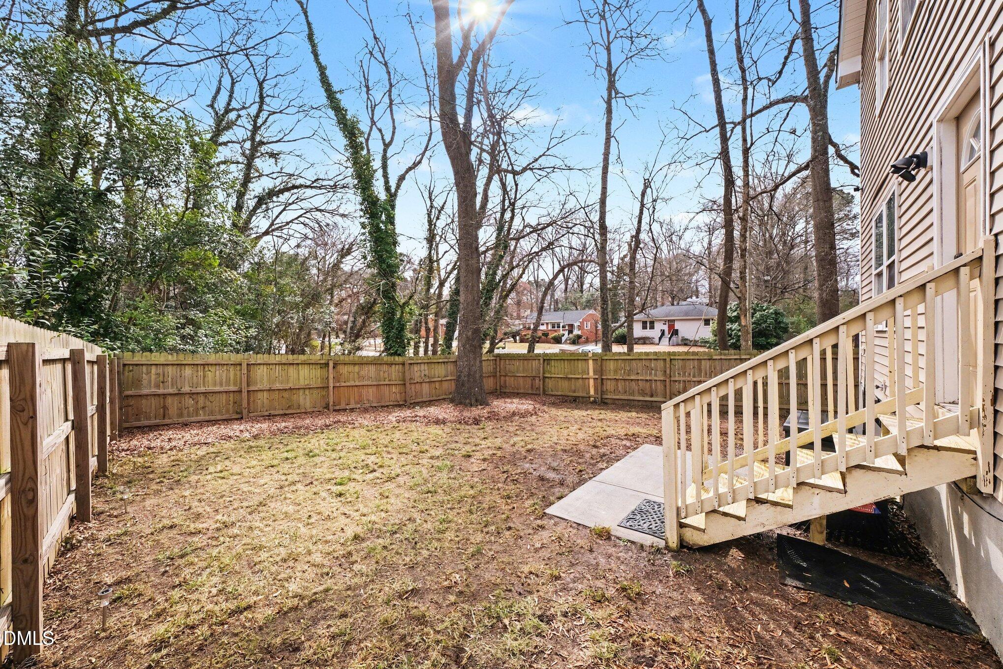 702 Brye Street Durham, NC 27703 - Photo 26 of 32 a view of a deck with a trees