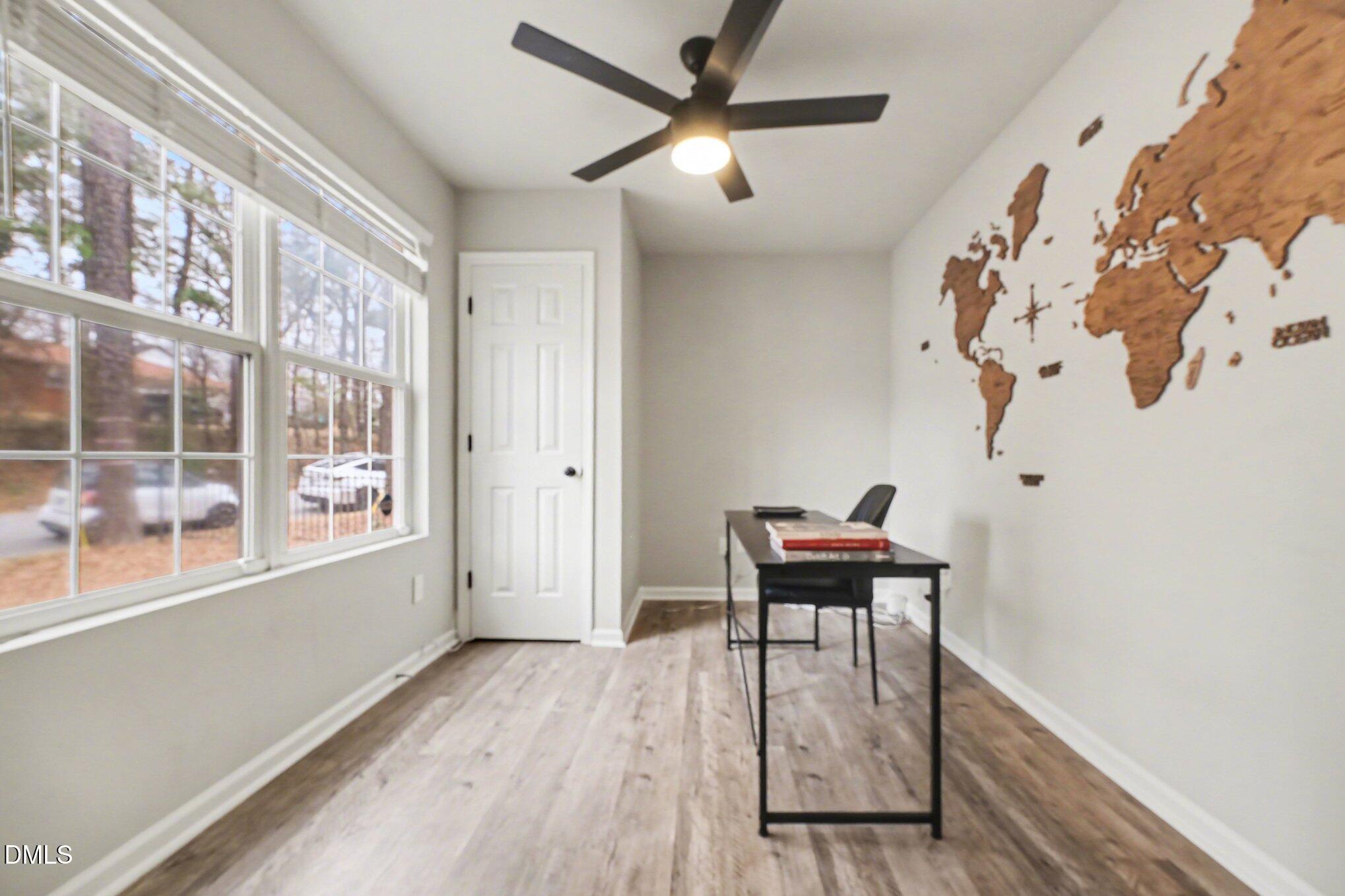 702 Brye Street Durham, NC 27703 - Photo 6 of 32 a living room with furniture and a large window