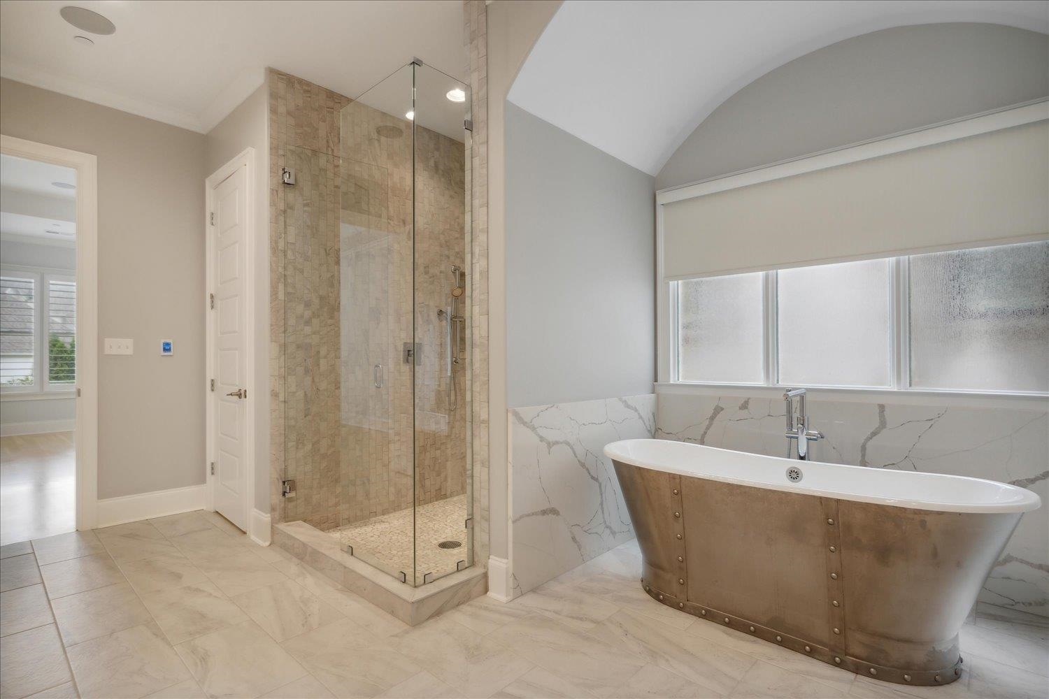 1676 Exeter Road Germantown, TN 38138 - Photo 20 of 38 a view of a bathtub in a bathroom