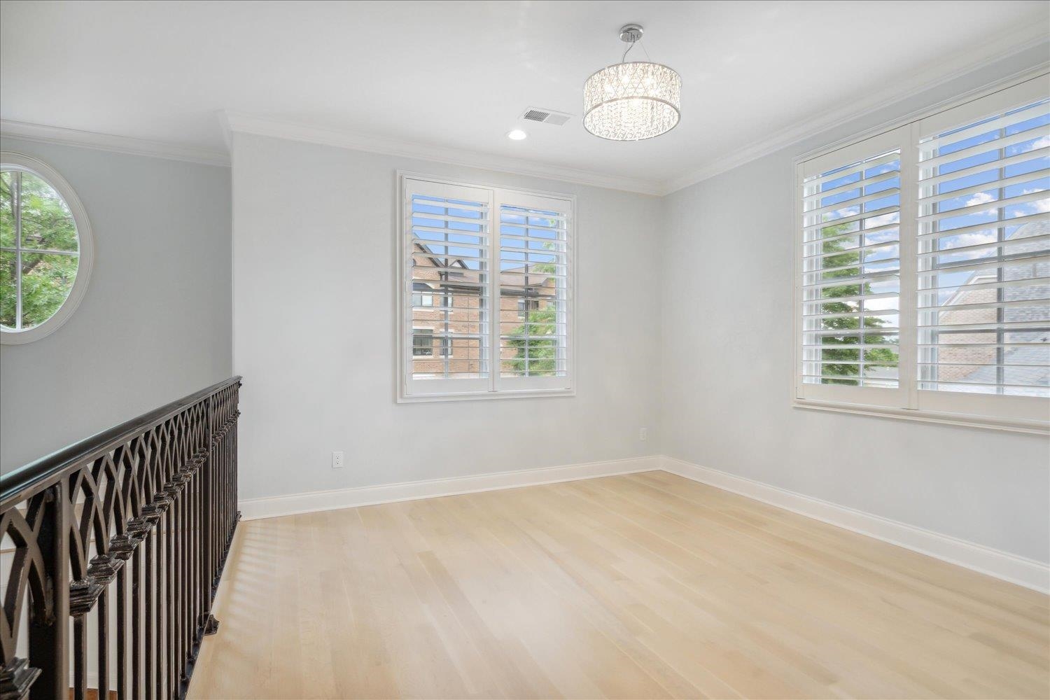 1676 Exeter Road Germantown, TN 38138 - Photo 25 of 38 wooden floor in an empty room with a window