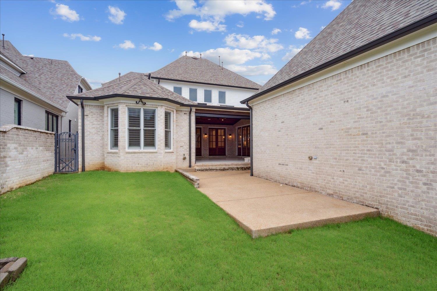 1676 Exeter Road Germantown, TN 38138 - Photo 34 of 38 a view of a house with a yard and fence