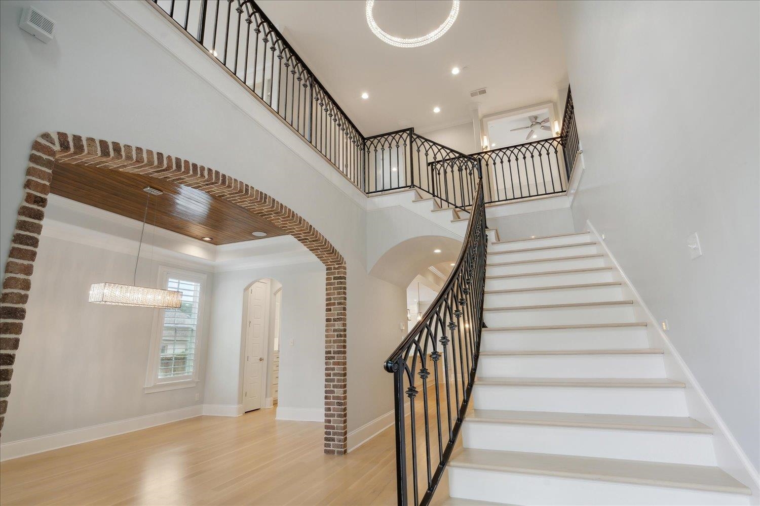 1676 Exeter Road Germantown, TN 38138 - Photo 4 of 38 a view of entryway and hall with wooden floor