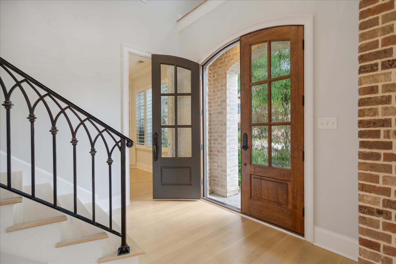 1676 Exeter Road Germantown, TN 38138 - Photo 5 of 38 a view of front door with hallway