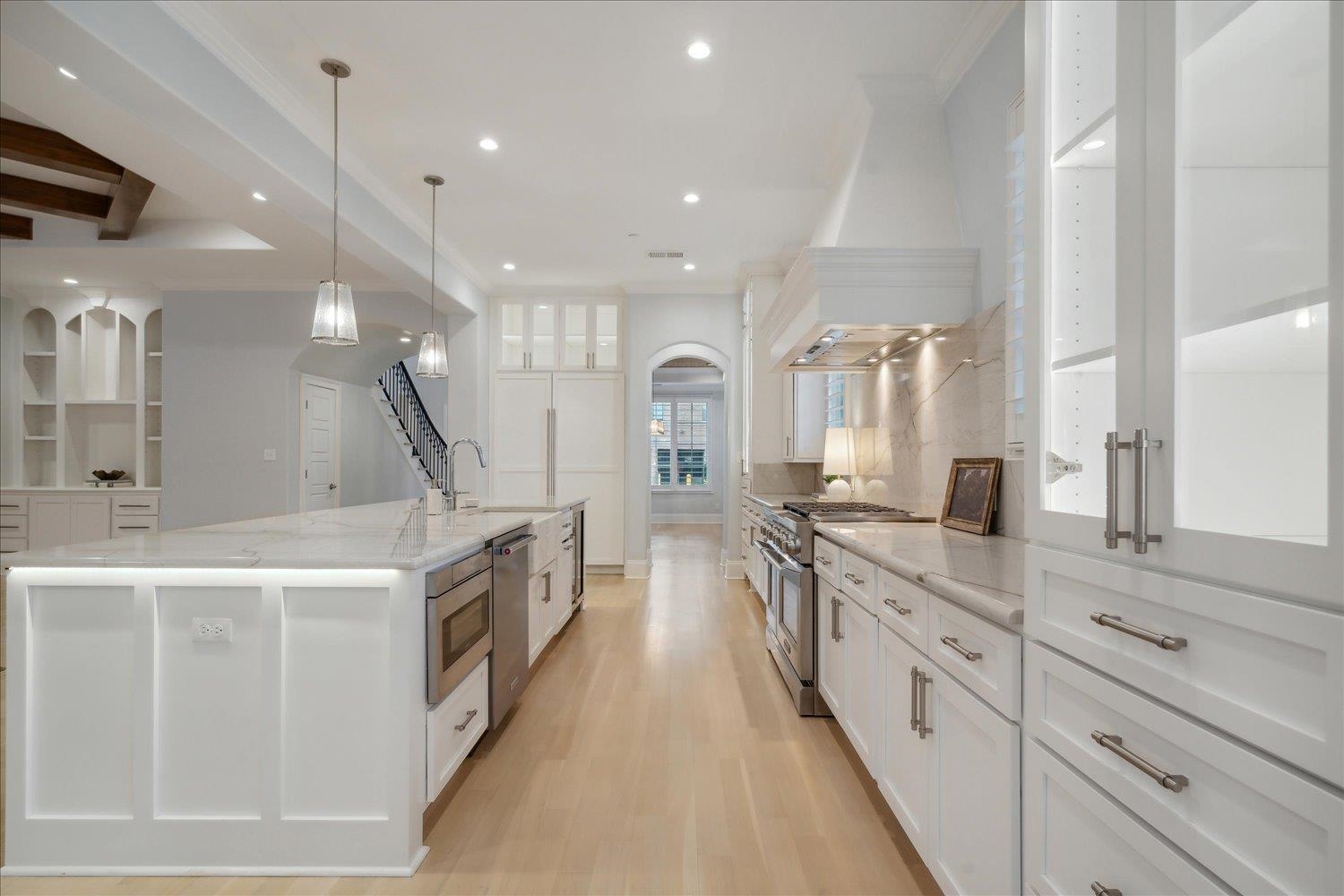 1676 Exeter Road Germantown, TN 38138 - Photo 9 of 38 a large white kitchen with lots of counter space