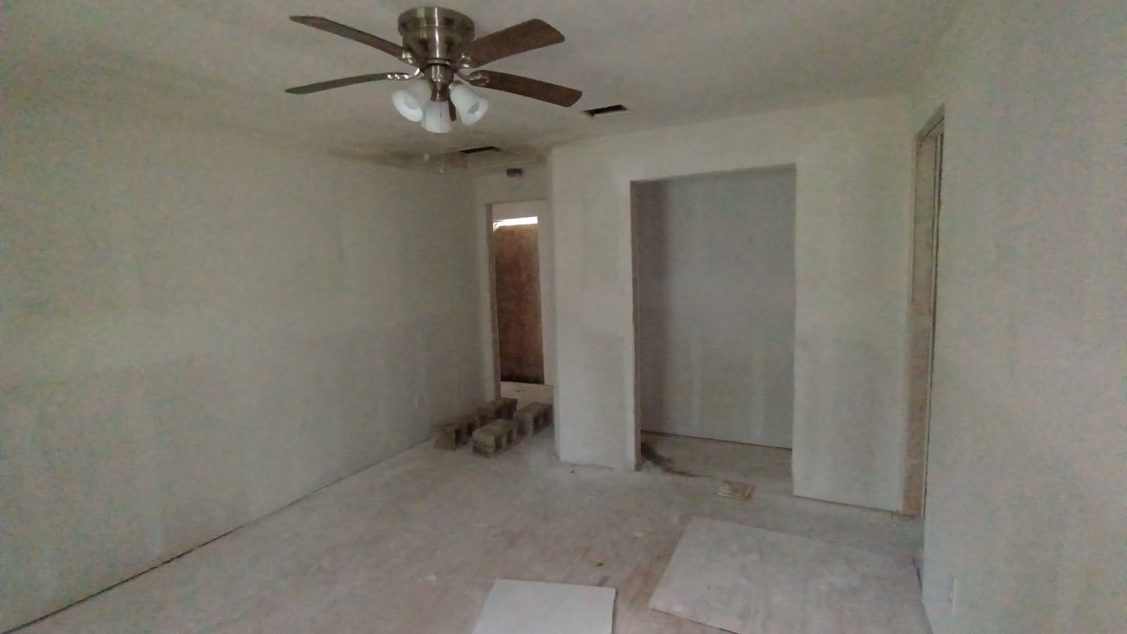 112 Ila Street Elgin, TX 78621 - Photo 11 of 27 an empty room with closet and a chandelier fan