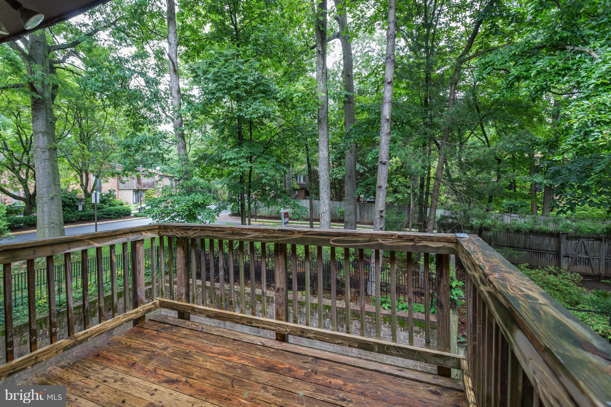 8000 Inverness Ridge Road Potomac, MD 20854 - Photo 22 of 25 a view of balcony with deck and trees