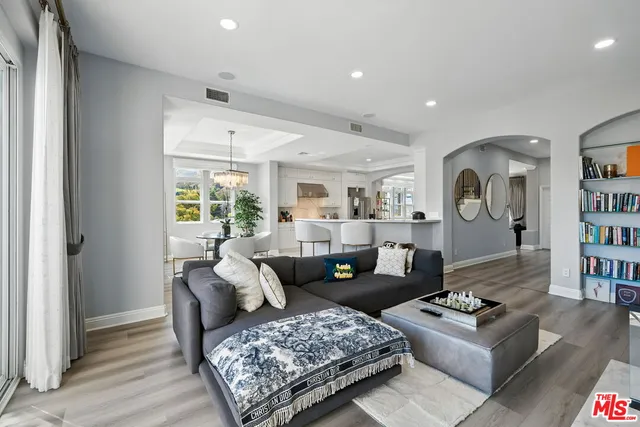 a living room with furniture and a couch