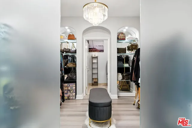 a view of a hallway with entryway dining space and livingroom