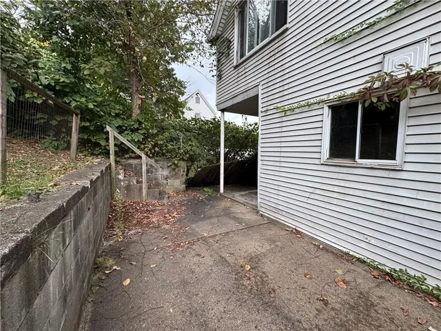 a view of a house with a yard and garage