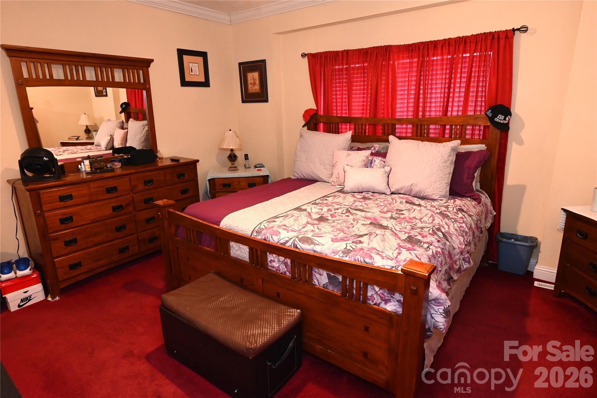 3951 Springs Road Northeast Conover, NC 28613 - Photo 13 of 19 a bedroom with a bed window and a flat screen television