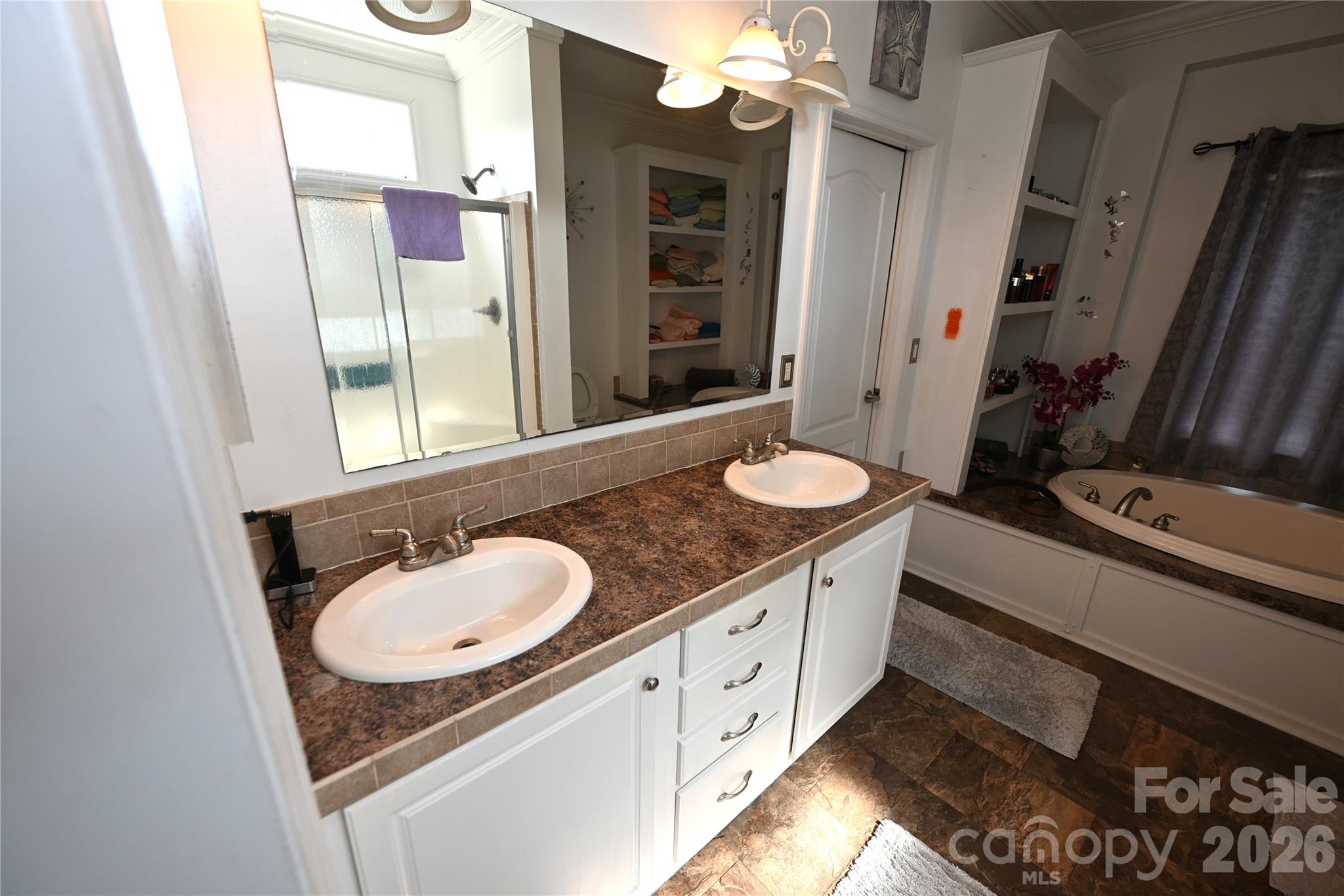 3951 Springs Road Northeast Conover, NC 28613 - Photo 14 of 19 a bathroom with a granite countertop double vanity sink and a mirror
