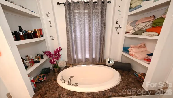 a view of a room with a washer and dryer