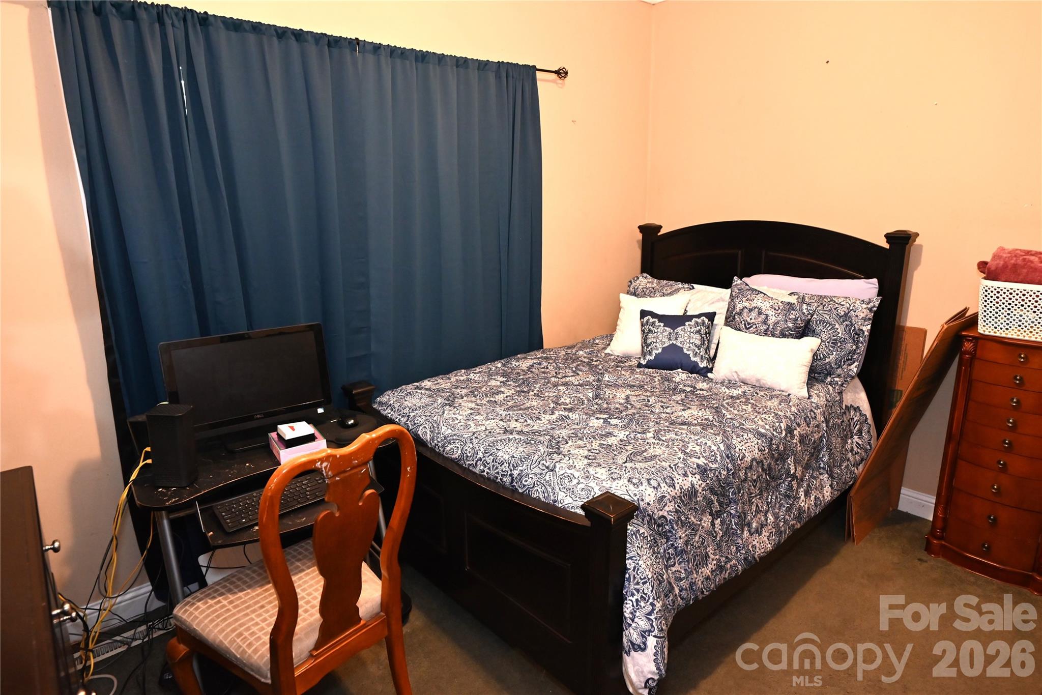 3951 Springs Road Northeast Conover, NC 28613 - Photo 18 of 19 a bedroom with a bed and a cabinet
