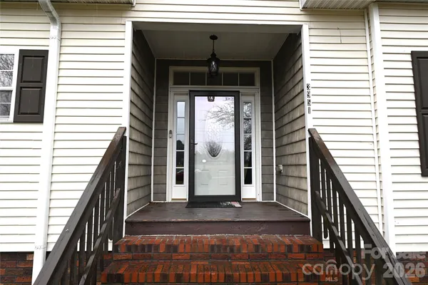 a view of entryway with a front door