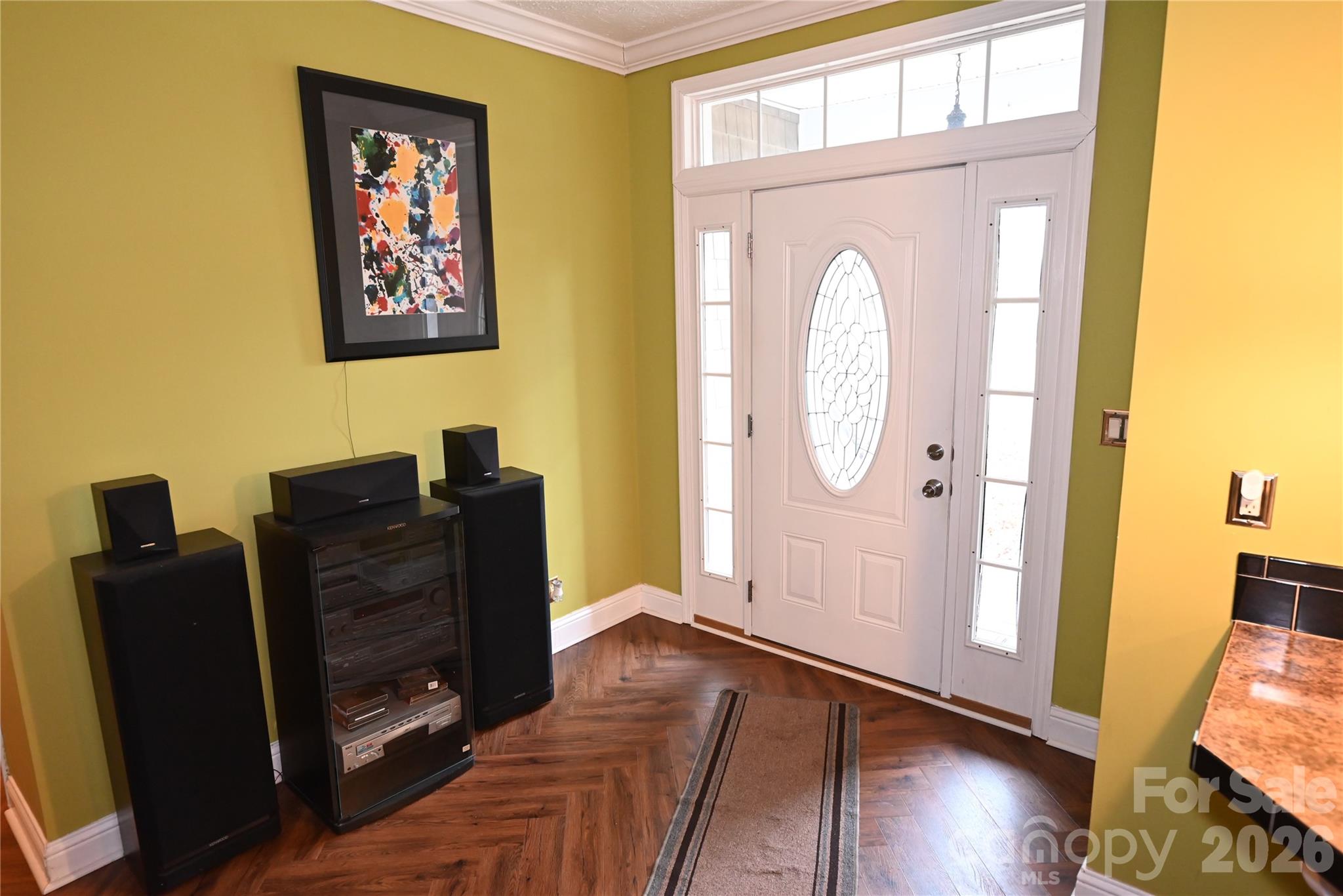 3951 Springs Road Northeast Conover, NC 28613 - Photo 5 of 19 a view of a hallway with wooden floor and furniture