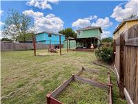 12209 Briarcreek Loop Manor, TX 78653 - Photo 21 of 23 a view of a backyard