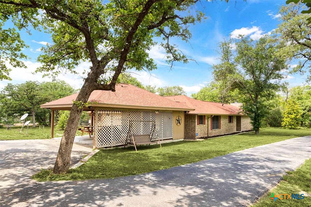 20-acres Guadalupe Ranch Lane Seguin, TX 78155 - Photo 12 of 42 front view of a house with a yard