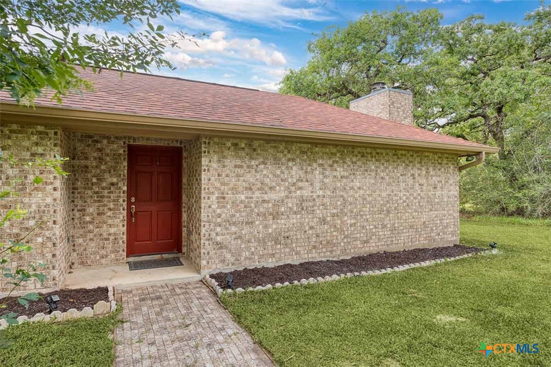 20-acres Guadalupe Ranch Lane Seguin, TX 78155 - Photo 13 of 42 a front view of a house with garden