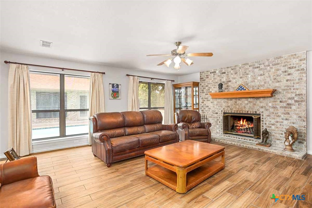 20-acres Guadalupe Ranch Lane Seguin, TX 78155 - Photo 16 of 42 a living room with furniture and a fireplace