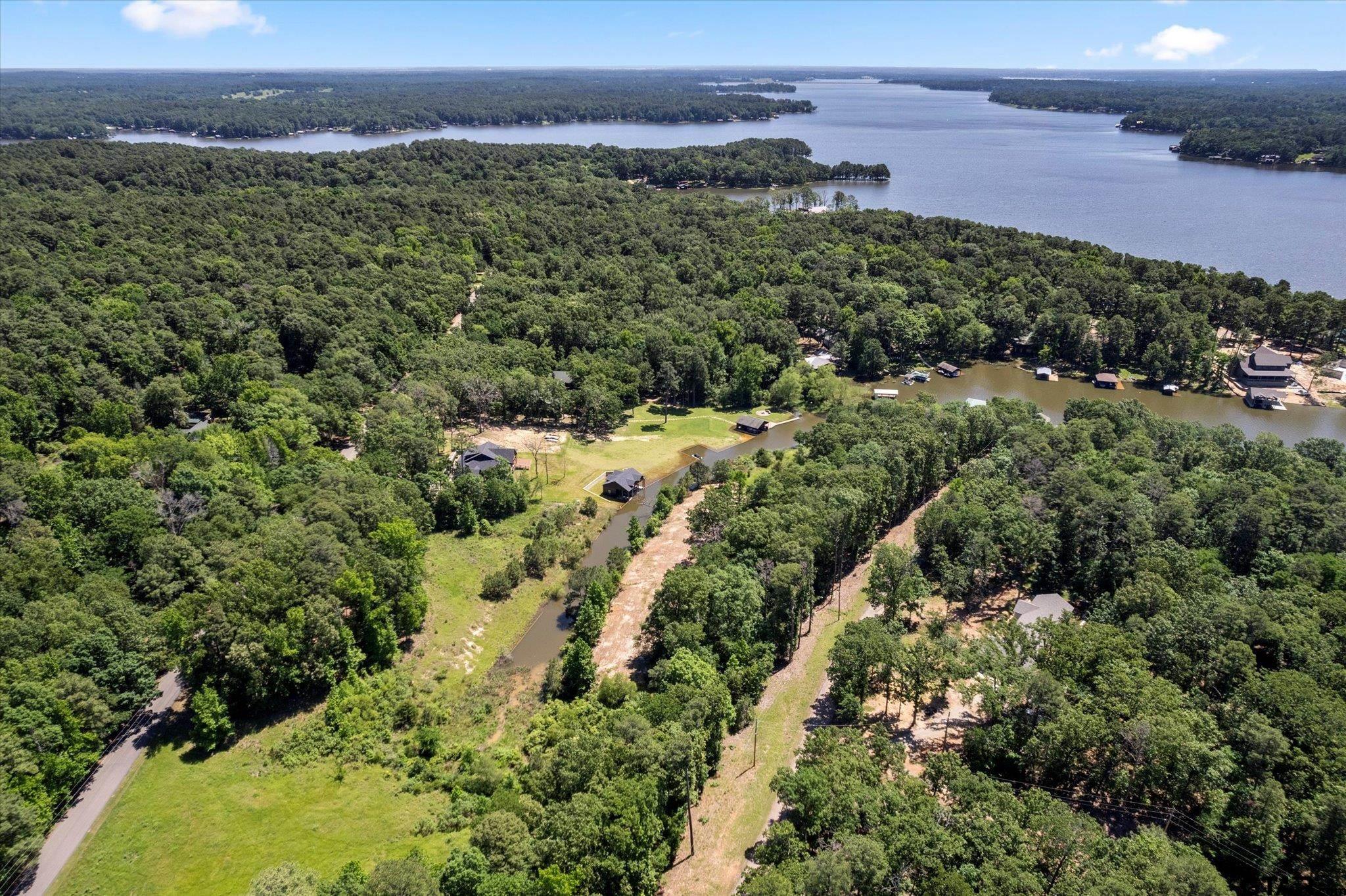 65 R King Fredrick Court Scroggins, TX 75480 - Photo 15 of 21 an aerial view of a houses with a yard