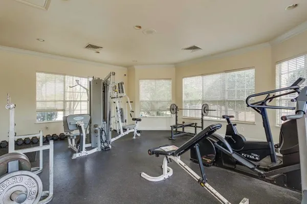 a view of a room with gym equipment