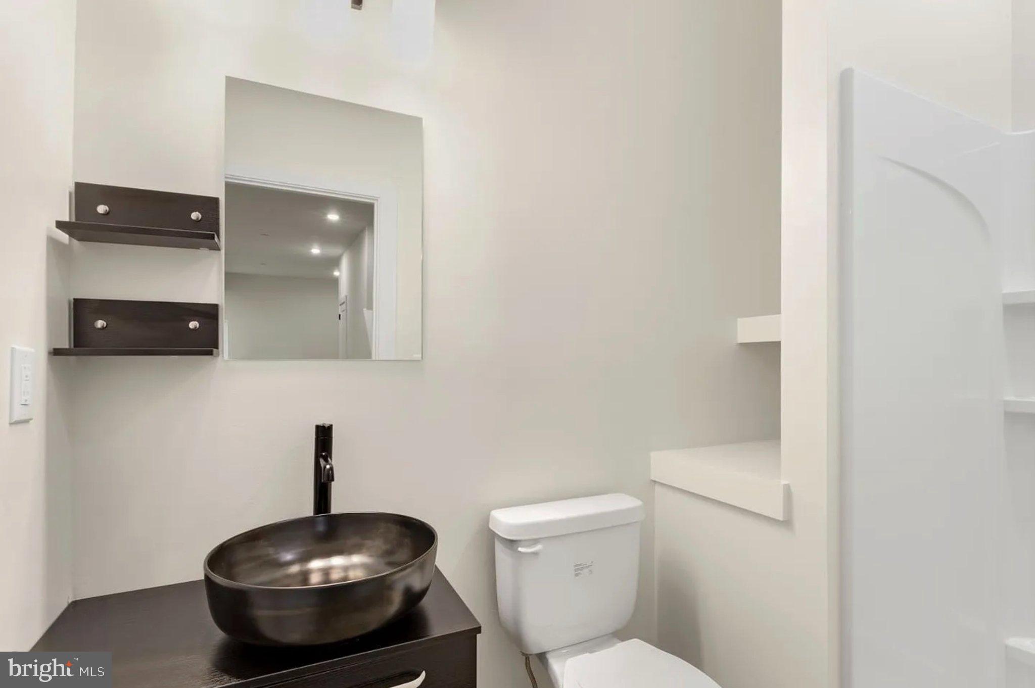 2719 Lefevre Street Philadelphia, PA 19137 - Photo 16 of 33 Sleek modern bathroom with elegance.