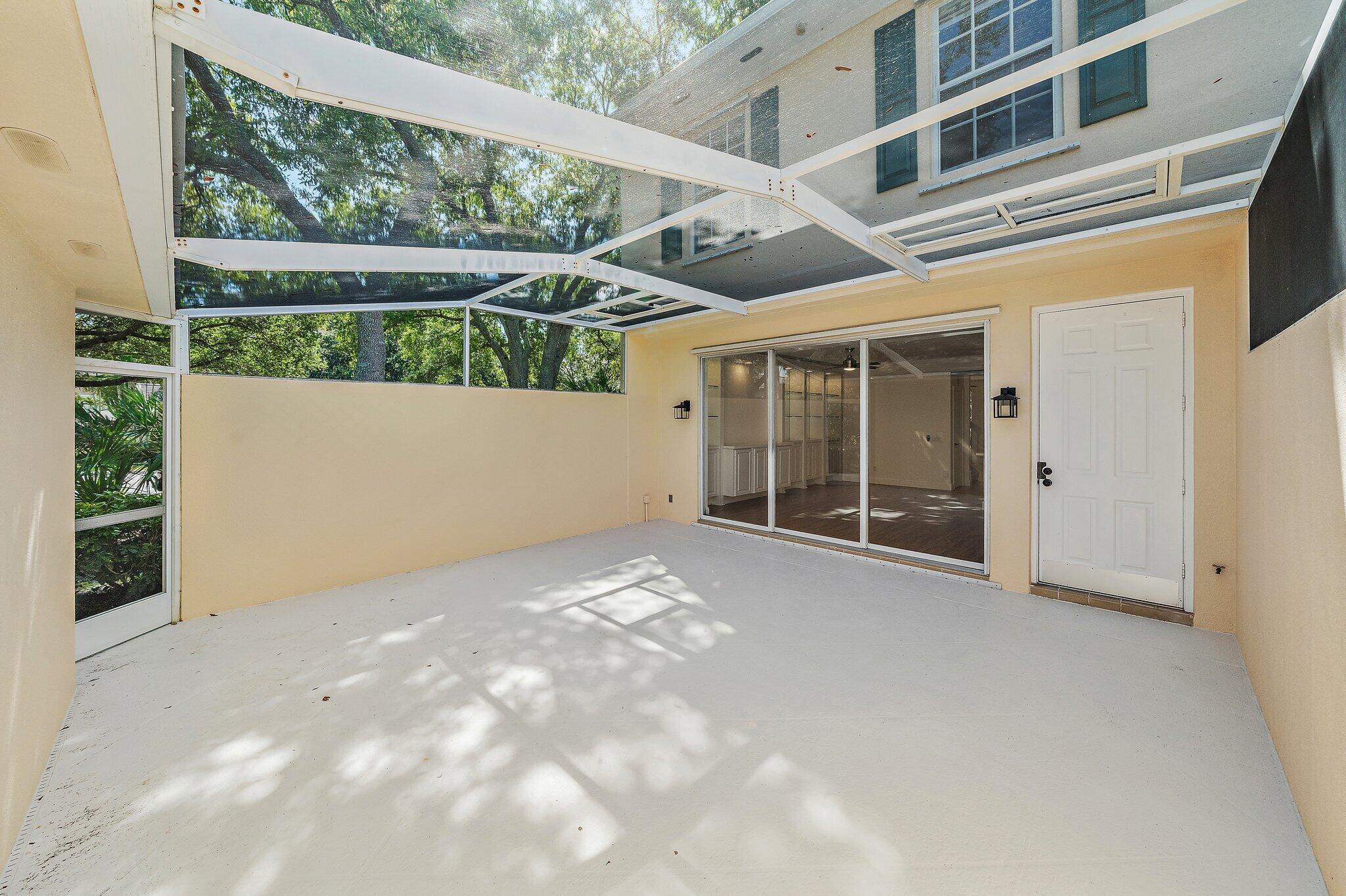 304 Legare Court Jupiter, FL 33458 - Photo 32 of 38 a view of a big room with a large window