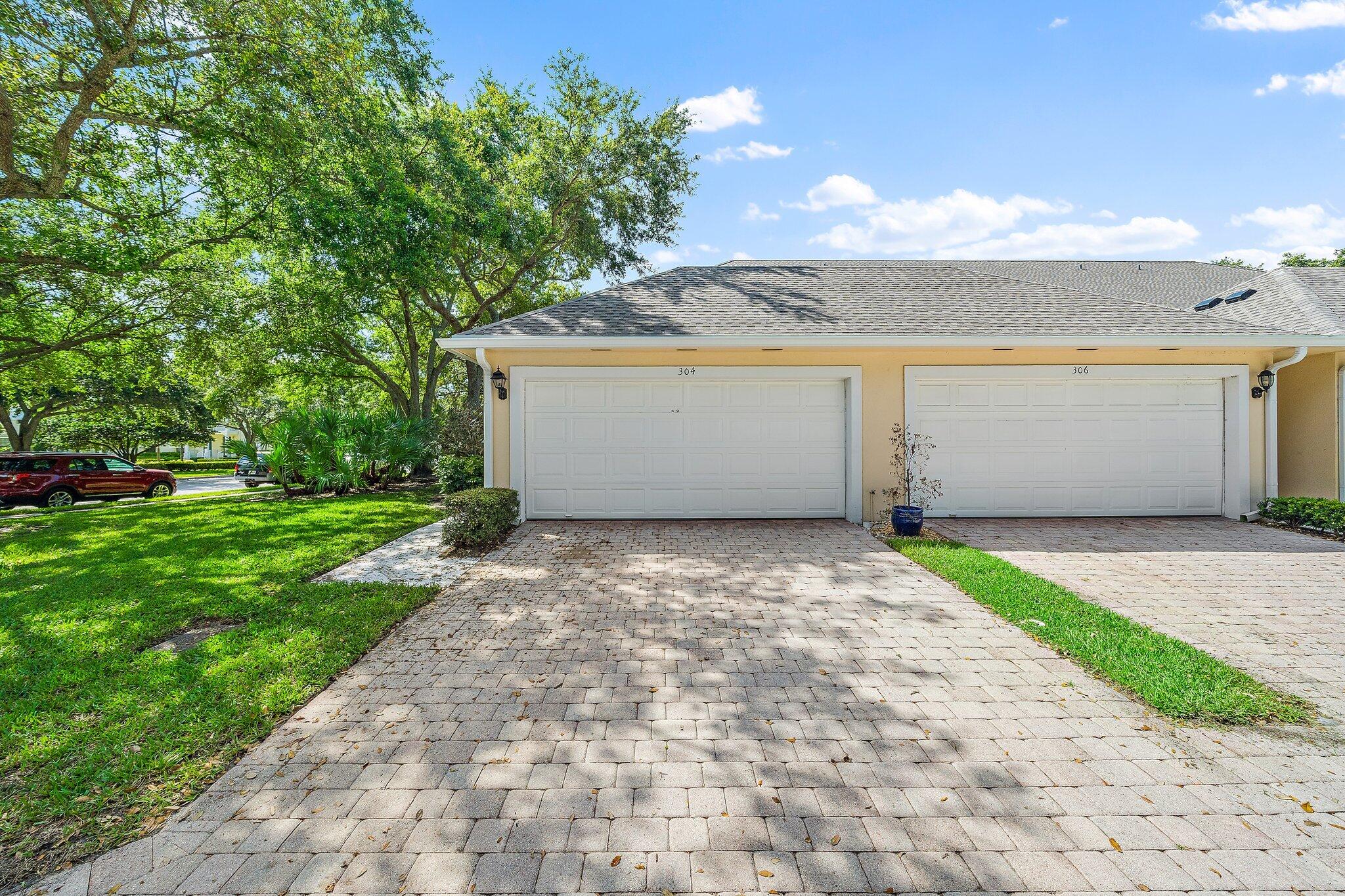 304 Legare Court Jupiter, FL 33458 - Photo 35 of 38 a view of a back yard of the house