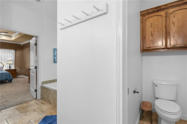 a swimming pool with outdoor seating