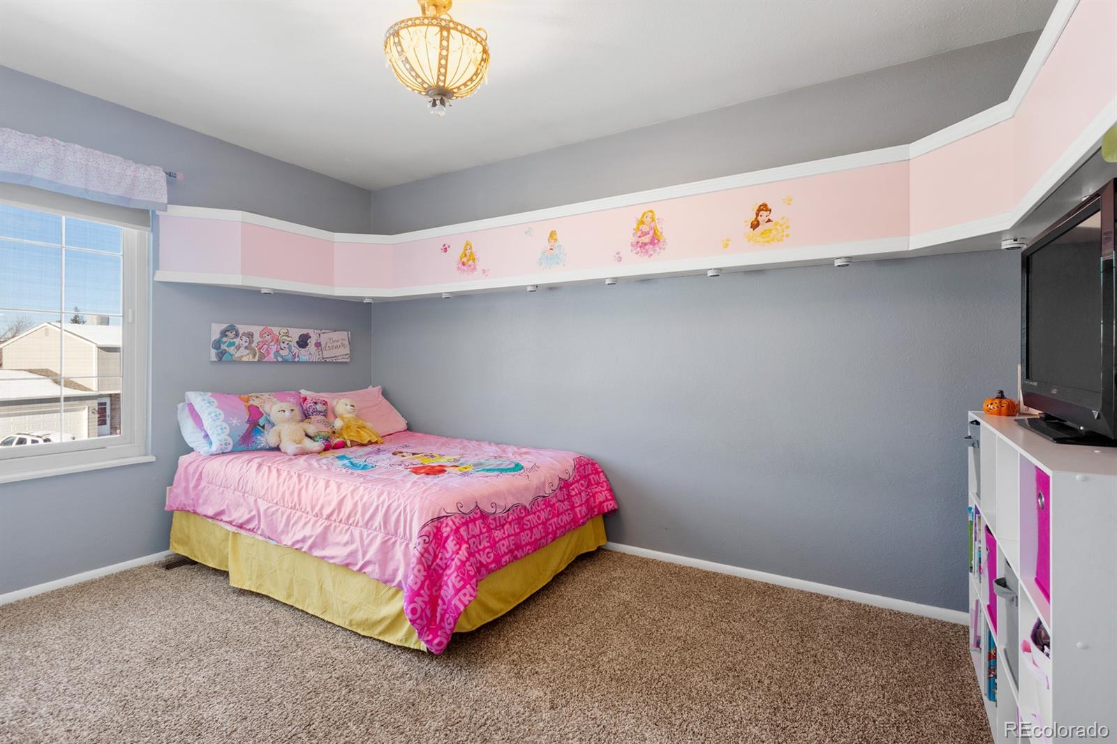 4262 South Quintero Way Aurora, CO 80013 - Photo 15 of 36 a bedroom with a bed and a window