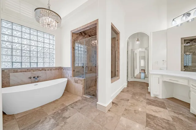 a bathroom with a sink vanity and a mirror