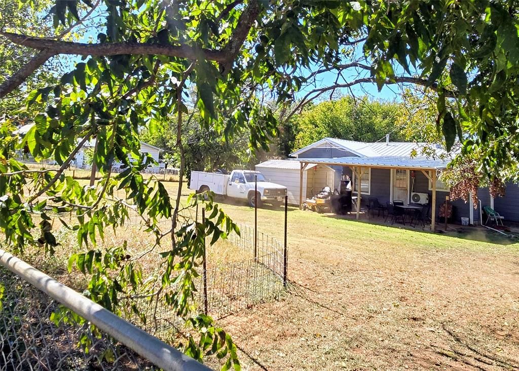 213 Blundell Street Ranger, TX 76470 - Photo 24 of 24 View of yard with a patio area