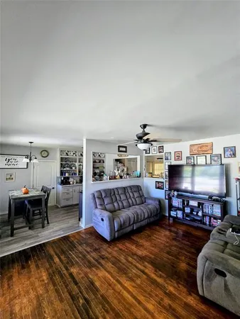 a living room with furniture and a couch
