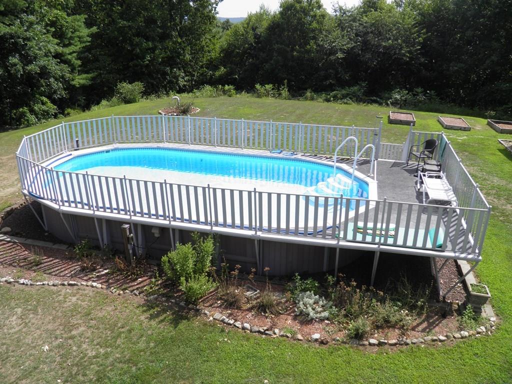 115 Fisherdick Road Ware, MA 01082 - Photo 26 of 30 a view of a roof deck with wooden fence