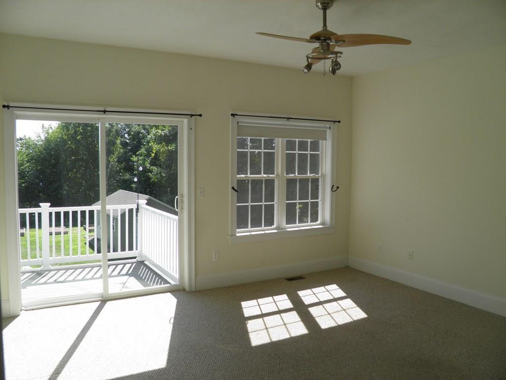 115 Fisherdick Road Ware, MA 01082 - Photo 3 of 30 an empty room with windows