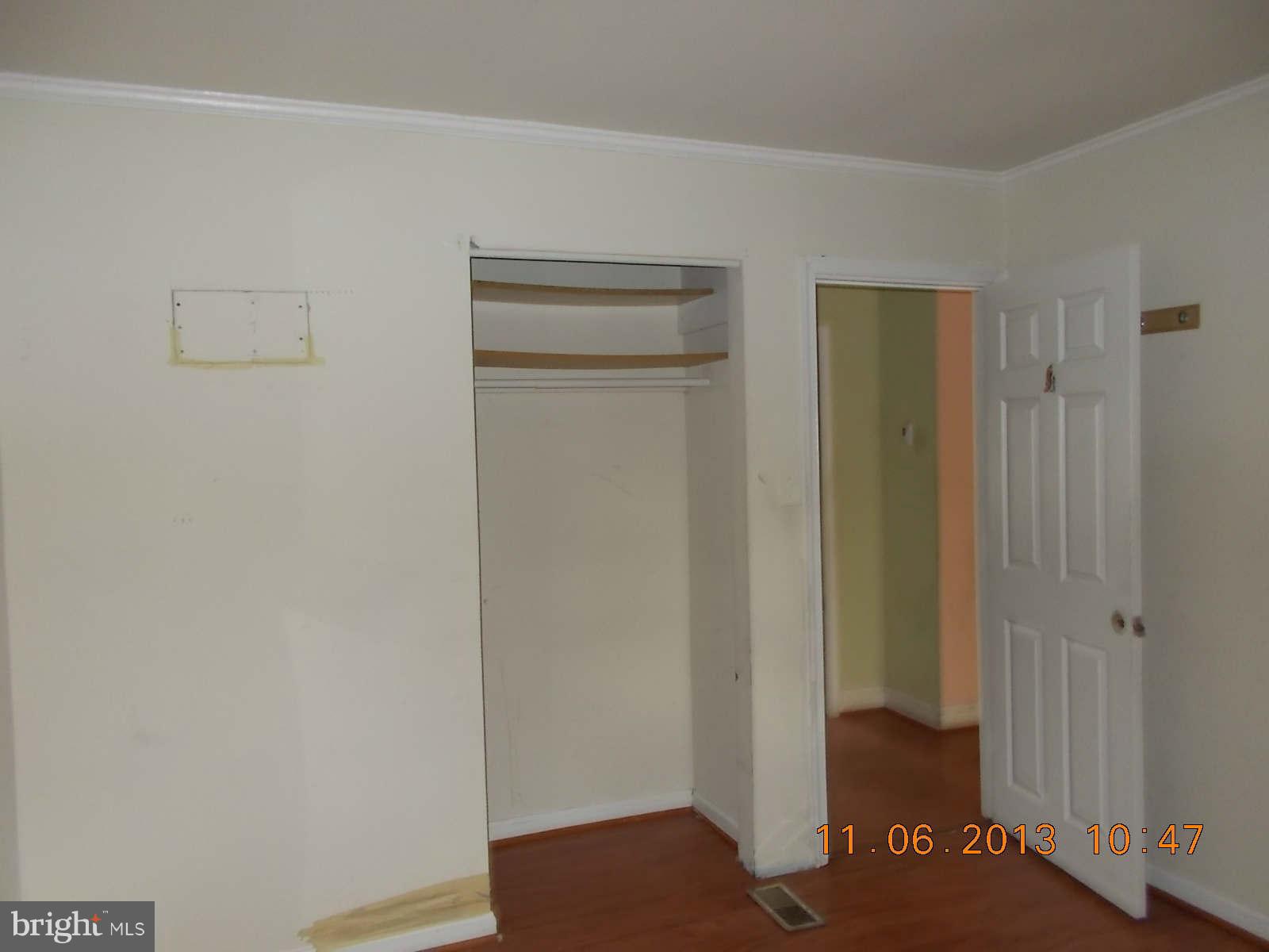 4411 Sigsbee Road Silver Spring, MD 20906 - Photo 8 of 20 a view of walk in closet with empty room