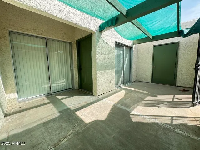 a kitchen with a sink a stove top oven and cabinets