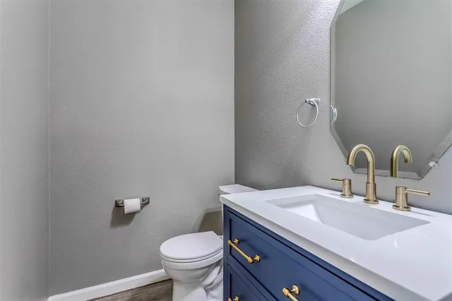 a bathroom with a sink and a toilet