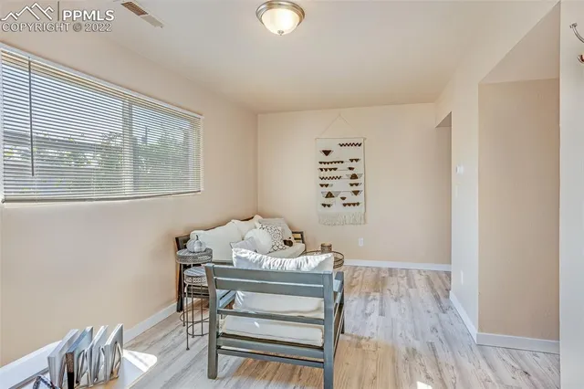 a room with furniture and a window