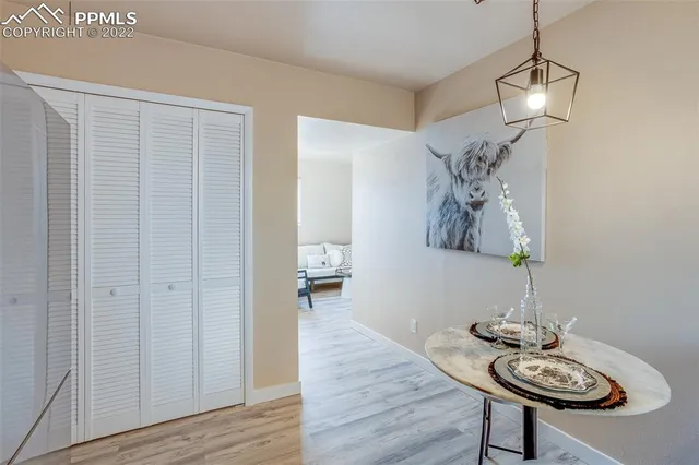 a room with furniture and wooden floor