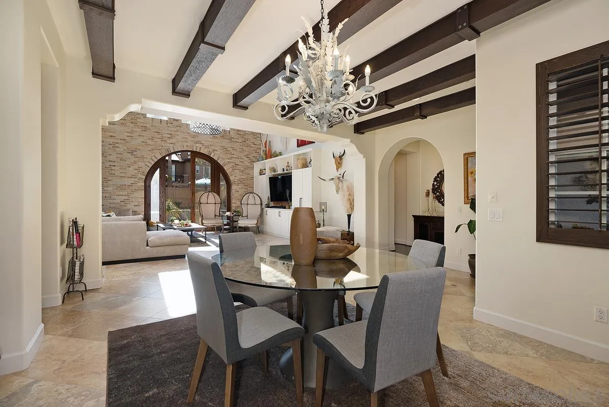14779 Rio Rancho San Diego, CA 92127 - Photo 11 of 35 a view of a dining room with furniture and a chandelier
