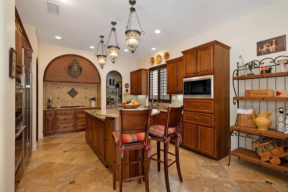 14779 Rio Rancho San Diego, CA 92127 - Photo 17 of 35 a view of a dining room kitchen and a window