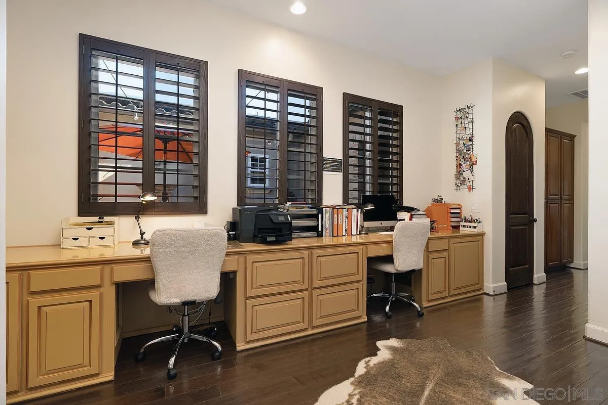 14779 Rio Rancho San Diego, CA 92127 - Photo 30 of 35 a view of a workspace with furniture and a window