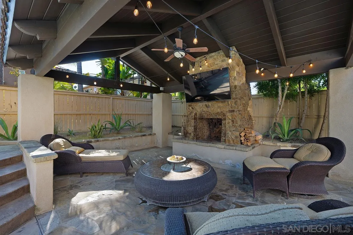 14779 Rio Rancho San Diego, CA 92127 - Photo 35 of 35 a living room with furniture and a fireplace