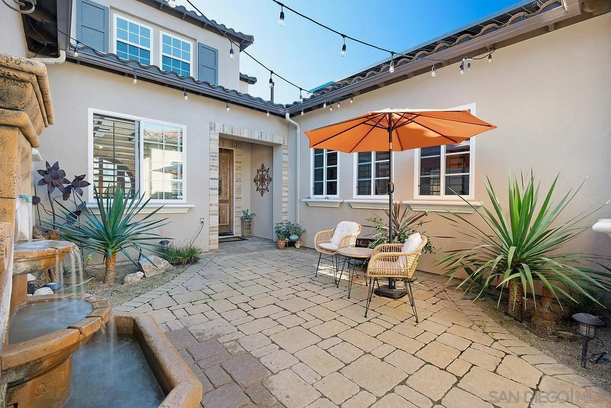 14779 Rio Rancho San Diego, CA 92127 - Photo 4 of 35 a view of a house with backyard and sitting area