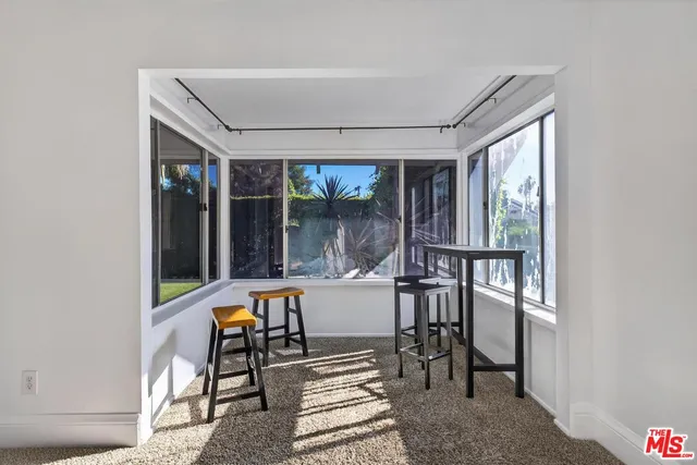 workspace with wooden floor and windows